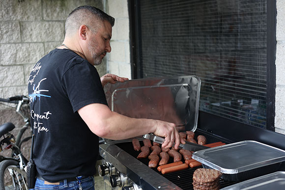 Hydrasearch team member barbequing